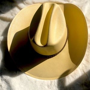 Cowboy hat. Brand/material unknown. Never worn. NWOT. Size adult Small/Medium.